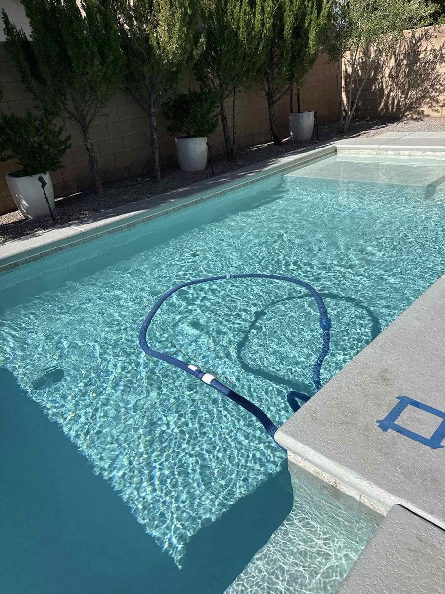 Pool after AquaVision Pool Care service visit — crystal clear water
